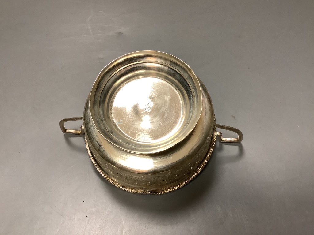 A Persian white metal sugar bowl and cover and five matching tea glass holders